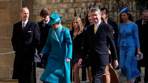 PA Media Anne walking with Edward and Tim Laurence 