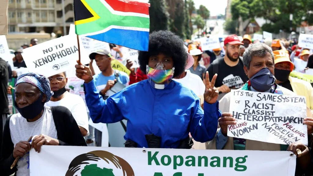 Protector or Predator? How anti-immigrant violence is undermining South Africa’s economic recovery Protector or Predator? How anti-immigrant violence is undermining South Africa’s economic recovery