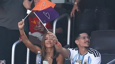 Getty Images US actress Jessica Alba (L) and US actor Danny Ramirez attend the 2026 World Cup football tournament final match between Spain and Argentina

