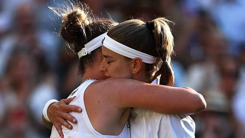 Linda Noskova and Karolina Muchova hug after their epic Wimbledon final