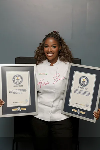Hilda holding two GWR certificates
