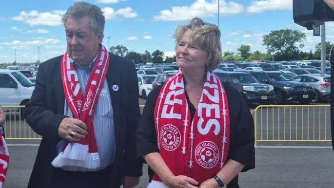 Christophe Gleizes' mother, Sylvie, speaks to journalists outside the New Jersey New York Stadium on Monday