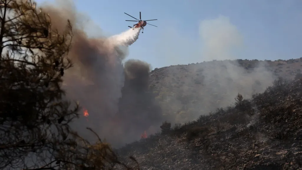 Two dead and hundreds evacuated as twin fires break out on Greek island