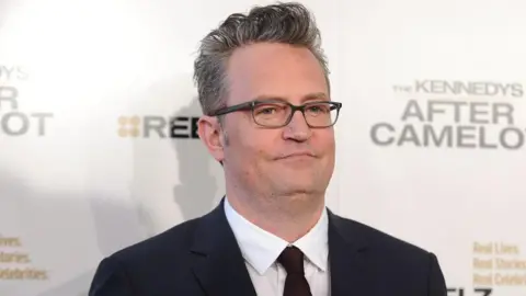 'Ketamine Queen' sentenced to 15 years in Matthew Perry overdose death Jason LaVeris/FilmMagic via Getty Images Matthew Perry wears glasses and a dark suit. He is posing for a picture on an event red carpet.