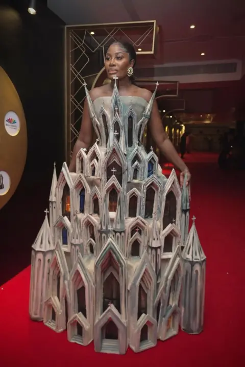 Dress made from 500 loaves stuns Africa Magic Viewers' Choice Awards BBC/MOBOLAJI OLATUNDE Nana Akua Addo in her outfit designed like a cathedral.