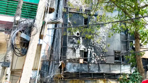 ANI A burnt building