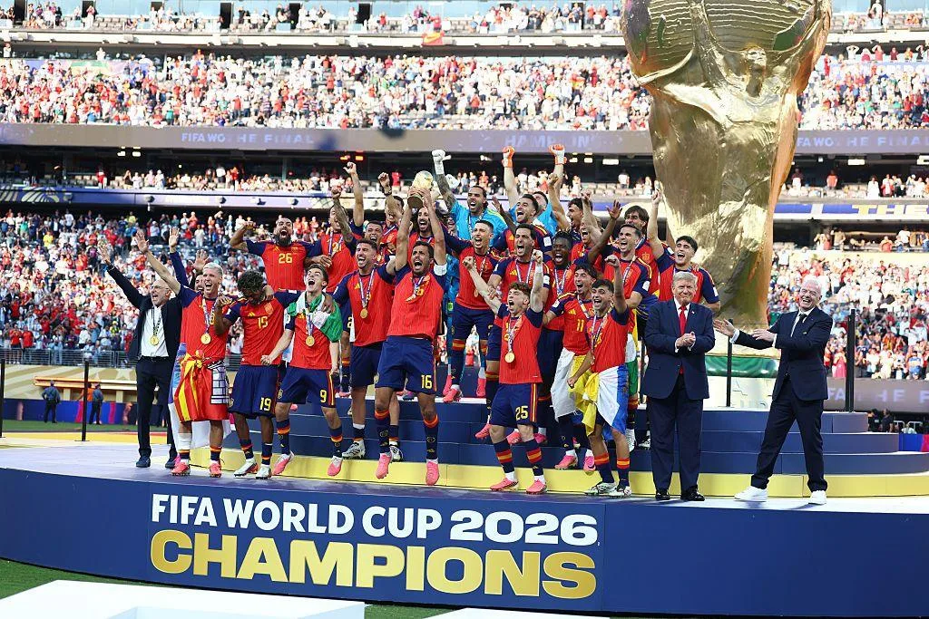 Spain players celebrate winning the World Cup