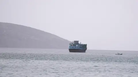 Reuters A vessel at the Strait of Hormuz, as seen from Musandam, Oman, on July 17.