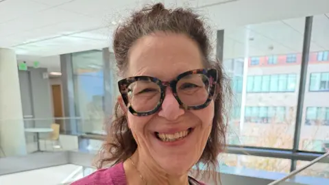 US weight-loss drugmakers slash prices in fight to win customers Shekinah Samayah-Thomas Shekinah Samayah-Thomas, wearing thick tortoiseshell glasses, smiling broadly in what appears to be an office building, with floor-to-ceiling windows behind her