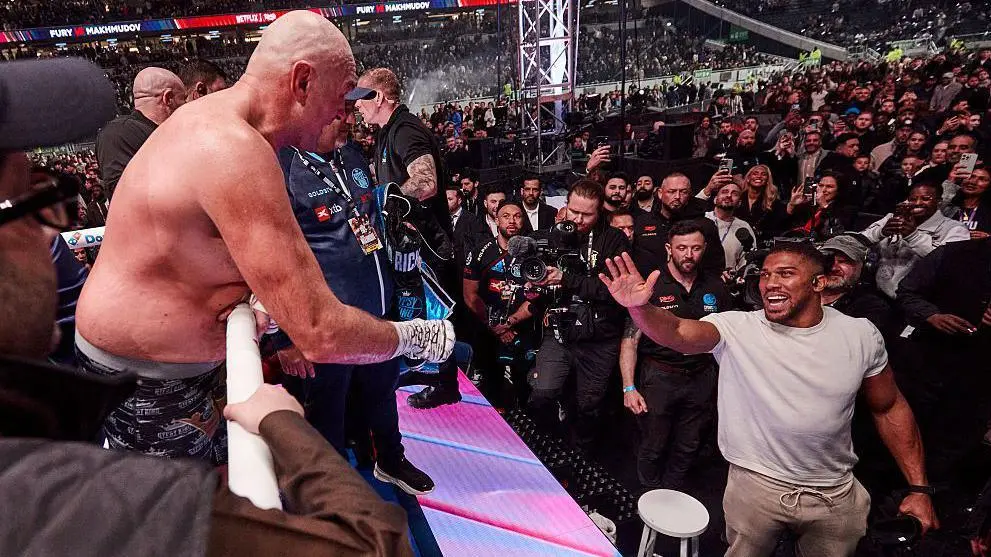 Tyson Fury shares words with Anthony Joshua after his latest win