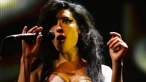 Getty Images Amy Winehouse performing at the 2007 awards