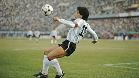 Retrial over death of Argentina legend Maradona begins Getty Images Maradona mid-play during the 1986 world cup (1986 FIFA World Cup qualifying match against Peru at the National Stadium on June 23)