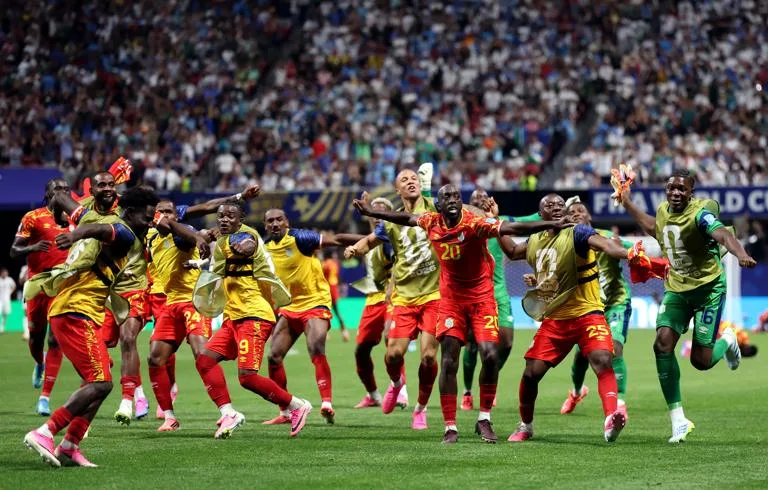 ATLANTA, GEORGIA - JUNE 27: Yoane Wissa #20 of Congo DR celebrates with teammates after scoring the team's third goal during the FIFA World Cup 2026 Group K match between Congo DR and Uzbekistan at Atlanta Stadium on June 27, 2026 in Atlanta, Georgia. (Photo by Molly Darlington/Getty Images)