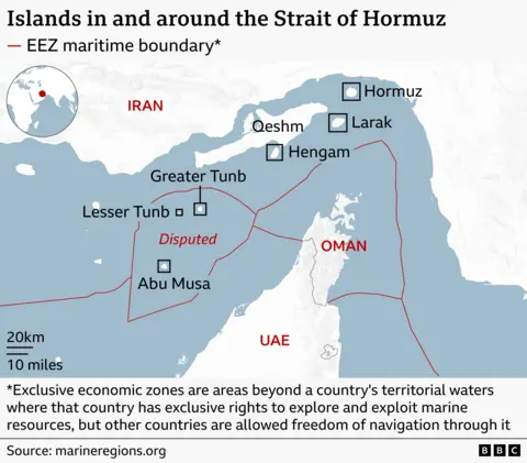A map of the Strait of Hormuz showing the surrounding coasts of Iran to the north and Oman and the UAE to the south. Several islands in the strait are labelled, including Hormuz, Larak, Qeshm, and Hengam near Iran, and Greater Tunb, Lesser Tunb, and Abu Musa further southwest. Red lines mark exclusive economic zone (EEZ) maritime boundaries. The area around Greater Tunb, Lesser Tunb and Abu Musa is labelled “Disputed.” A footnote explains that EEZs give countries exclusive rights to marine resources while allowing freedom of navigation. 