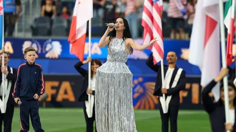 'Boyfriend duties call,' Trudeau says after skipping Canada match to watch Perry Getty Images Katy Perry and 10-year-old Norwegian singer Tius Luka perform Wonder live during the Opening Ceremony before the FIFA World Cup 2026 Group D match between USA and Paraguay at Los Angeles Stadium on June 12, 2026 in Los Angeles, California.