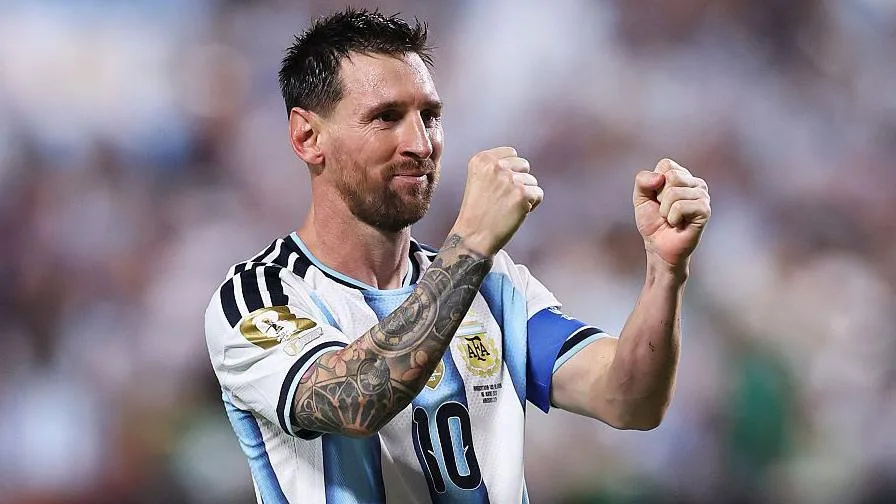 Lionel Messi clenching his fists in celebration