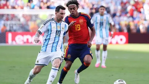 Getty Images Lionel Messi controls the ball against Lamine Yamal during the FIFA World Cup 2026 Final match between Spain and Argentina