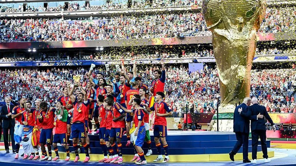 Spain's players celebrate winning the World Cup