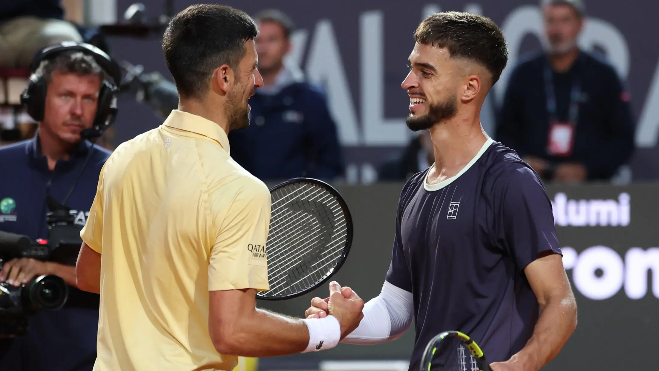 Djokovic stunned on return to action in Rome Novak Djokovic shakes hands with Dino Prizmic after the match