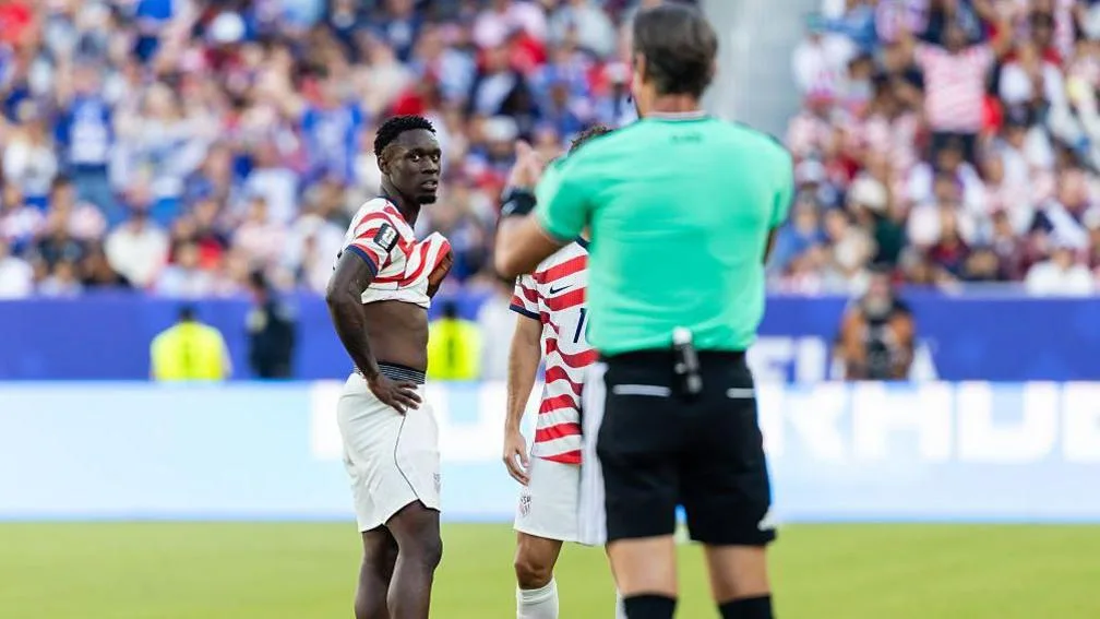 USA striker Folarin Balogun receiving a red card in America's match against Bosnia and Herzegovina  