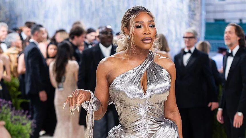 Serena Williams wears a silver dress while attending the Met Gala in early May 