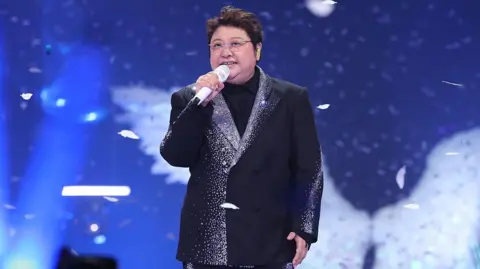 Getty Images Singer Han Hong attends the Peacebird 30th Anniversary Celebration on June 1, 2026 in Ningbo, Zhejiang Province of China.