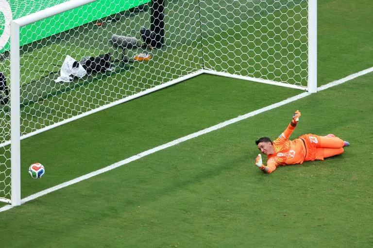 ZAPOPAN, MEXICO - JUNE 26: Fernando Muslera #23 of Uruguay  reacts after conceding the first goal to Alex Baena #15 of Spain during the FIFA World Cup 2026 Group H match between Uruguay and Spain at Guadalajara Stadium on June 26, 2026 in Zapopan, Mexico. (Photo by Luke Hales/Getty Images)