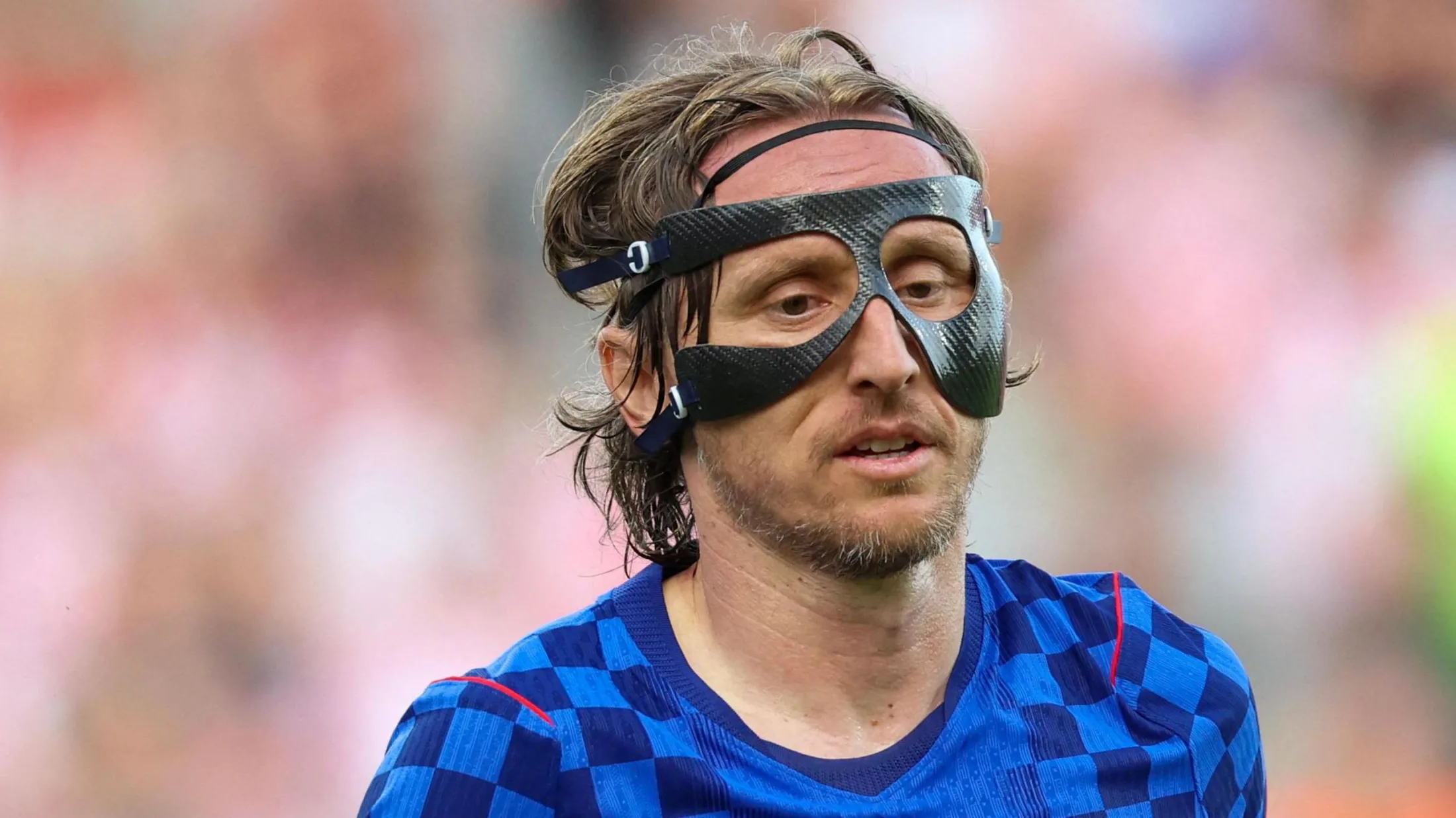 Croatia's captain Luka Modric wearing a protective face mask