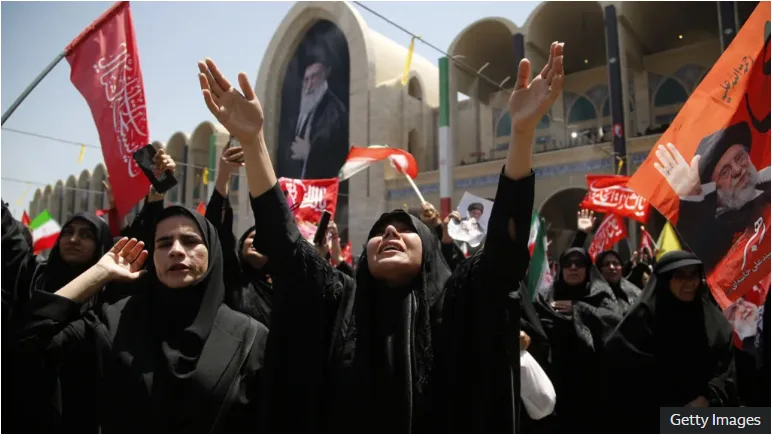 Iran's supreme leader absent as senior officials attend ayatollah's funeral