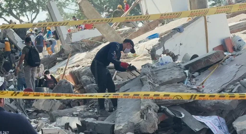 Brother of man trapped under rubble in Colombian quake clings on to hope Brother of man trapped under rubble in Colombian quake clings on to hope