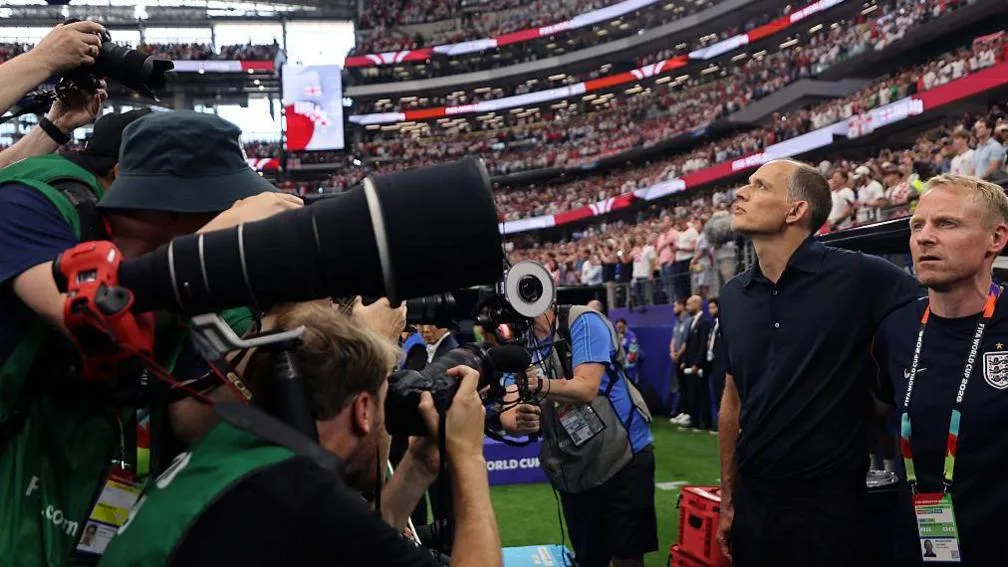 Thomas Tuchel has loads of cameras blocking his view of the pitch