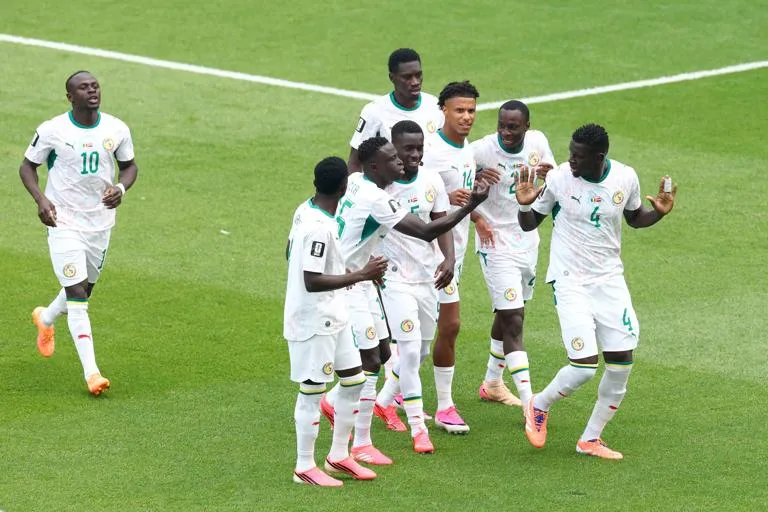 TORONTO, ONTARIO - JUNE 26: Abdoulaye Seck #4 of Senegal celebrates with teammates after scoring his team's first goal during the FIFA World Cup 2026 Group I match between Senegal and Iraq at Toronto Stadium on June 26, 2026 in Toronto, Ontario. (Photo by Robert Cianflone/Getty Images)