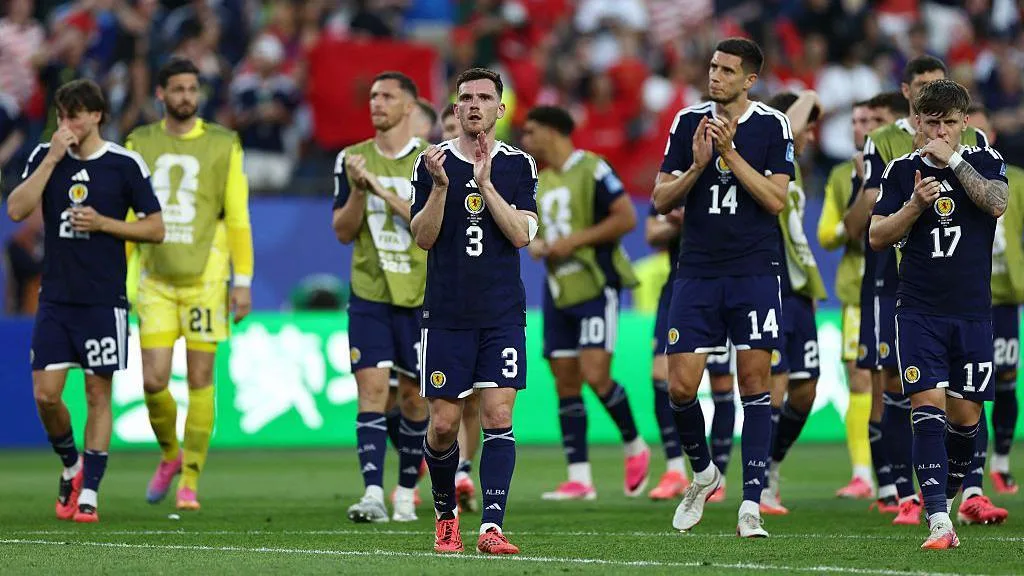 Scotland players acknowledge the crowd after losing 1-0 to Morocco
