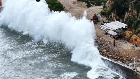 China evacuates one million from homes as massive storm arrives Reuters Huge waves crash on the coast of Huangqi in Lianjiang county, as Typhoon Dolphin approaches, in Fujian