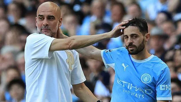 Pep Guardiola and Bernardo Silva