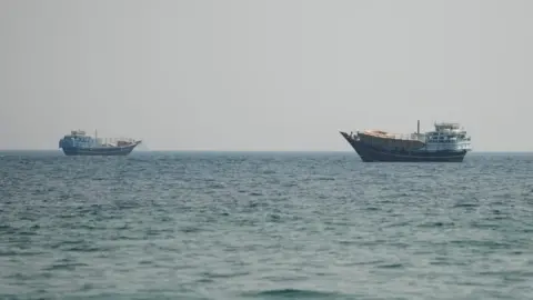 Reuters Vessels sail in the Strait of Hormuz. Photo: 12 July 2026