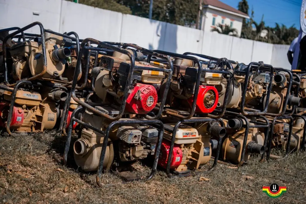 NAIMOS hands over 100 seized galamsey pumping machines to NSA for agriculture project