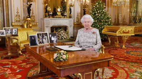 Getty Images Queen Elizabeth II poses for a photo after she recorded her annual Christmas Day message, in the White Drawing Room at Buckingham Palace in a picture released on December 25, 2018