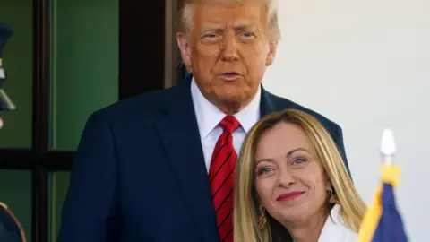 Italian PM condemns ally Trump over 'unacceptable' Pope criticism EPA US President Donald Trump (L) greets Italian Prime Minister Giorgia Meloni at the White House in April 2025.
