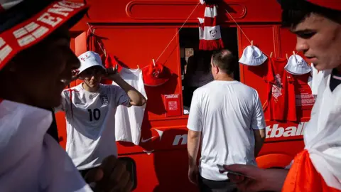 The financial winners and losers from the World Cup Getty Images England fans collect merchandise before the highly anticipated World Cup semi-final.