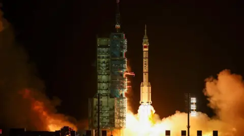 First Hong Kong astronaut launches into space onboard Chinese mission Reuters China's Shenzhou-23 launches into space at night, with its rocket boosters emitting gigantic flames and thick white smoke