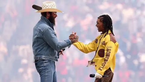 Carl Recine/Getty Images Post Malone and Swae Lee perform during the closing ceremony before the FIFA World Cup 2026 Final match between Spain and Argentina