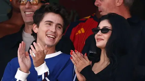 Getty Images Timothee Chalamet and Kylie Jenner clapping