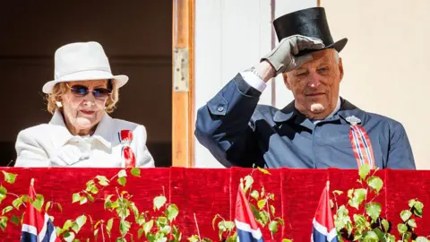 Norway braces for verdict in rape trial of crown princess's son Høiby Per Ole Hagen/Getty Images A man and woman on a platform in front of Norwegian flags