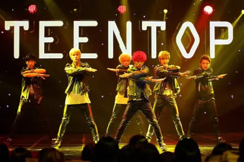 Getty Images This photo taken on September 26, 2013 shows South Korean idol band "Teen Top" performing at Mnet Countdown in Seoul.