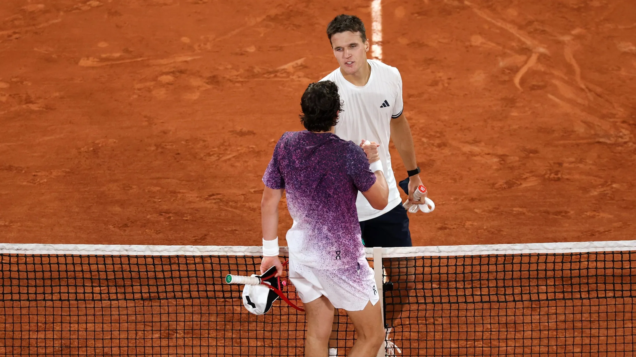 Zverev to face Mensik after ending Jodar run Jakub Mensik shakes hands with Joao Fonseca