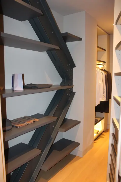 Would you pay $58.5m to live in this iconic New York building? Grace Eliza Goodwin Zig-zagging steel beams with shelves built into them in a walk-in closet