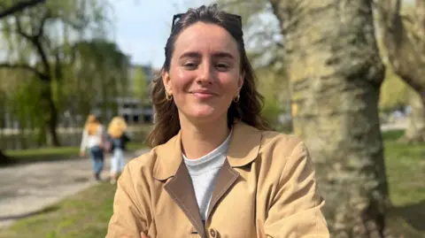 Amsterdam bans public adverts for meat and fossil fuels Lawyer Hannah Prins smiles at the camera