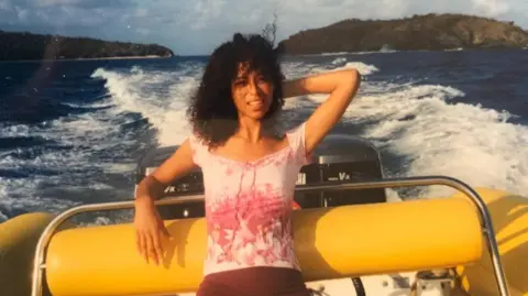 'He liked the fear in our eyes', Epstein survivors tell BBC BBC Newsnight Lisa Phillips on a boat wearing a pink top and with her left arm posing behind her head. Epstein's island is in the background
