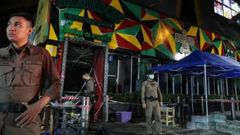 Reuters Police standing outside the venue